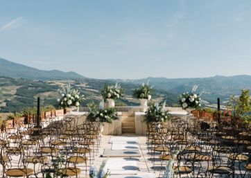 Tuscan hills view wedding ceremony