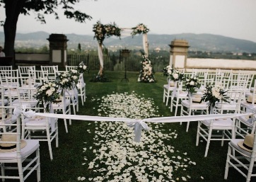 Wedding ceremony setting in the garden in Tuscany